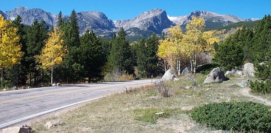 A scenic paved road to Bear Lake, an alpine lake in CO